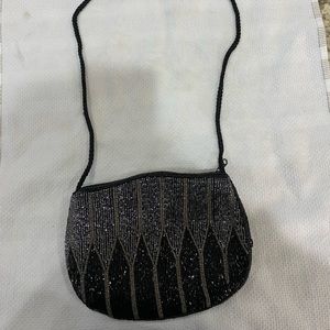 With holiday parties coming, this elegant beaded Evening bag is perfect !